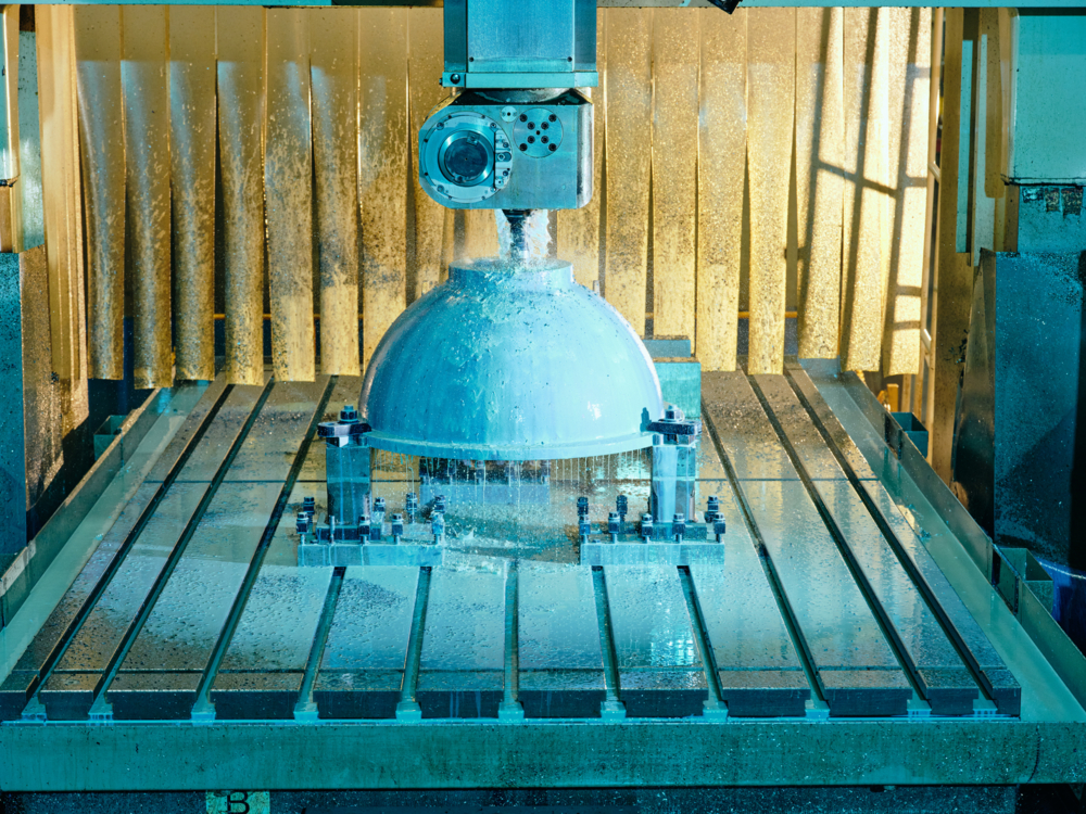 Close-up of the Okuma MCM-B mill running at QuadMetalworks